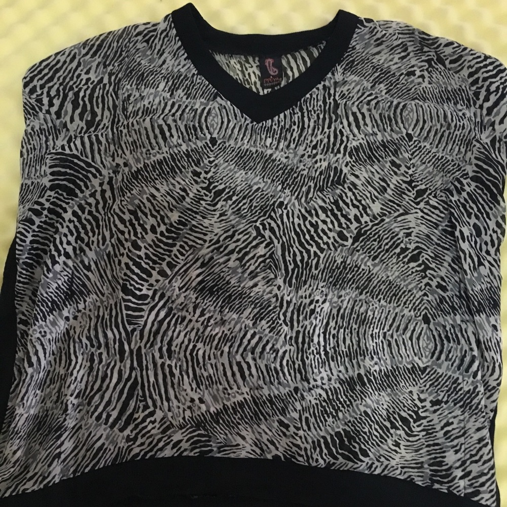 Beautiful sleeveless top. NWOT